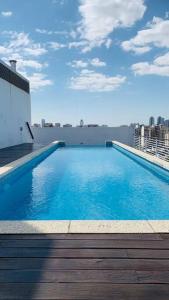 The swimming pool at or close to Modern Studio close to Ave 9 de Julio