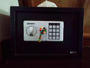a picture of a remote control with beads on it at DEA Gili Cottages in Gili Meno