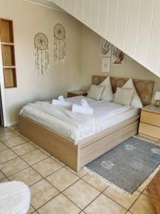 Katil atau katil-katil dalam bilik di Ferienwohnung Bornheim