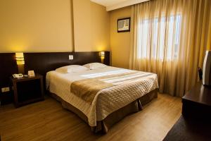 Postel nebo postele na pokoji v ubytování Hotel Campo Largo Comfort