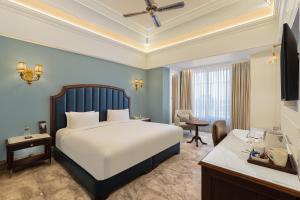 Hotel Hillock Ahmedabad客房内的一张或多张床位