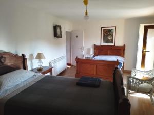 Łóżko lub łóżka w pokoju w obiekcie Casa 643km