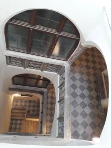 a model of a building with a checkered floor at Blick aufs Goldene Dachl in Innsbruck