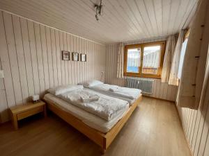Postel nebo postele na pokoji v ubytování Chalet Diana - Spacious flat - Village core - South facing - Ski-in/Ski-out