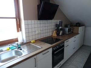 Η κουζίνα ή μικρή κουζίνα στο Ferienwohnung Waldweg