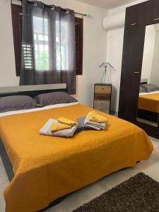Postel nebo postele na pokoji v ubytování Appartement 'Ambre'