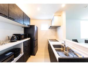 Una cocina o cocineta en Terrace Toyohira / Vacation STAY 81233