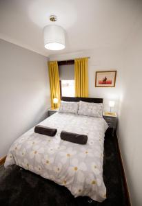 Säng eller sängar i ett rum på Glen Nevis View
