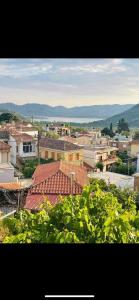 a view of a city with roofs of buildings at Casa de Pera in Mytilene