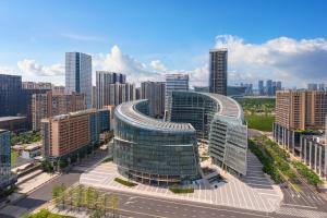 an aerial view of a city with tall buildings at Somerset Gaoxin Chengdu in Chengdu