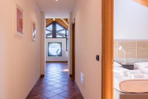 Posteľ alebo postele v izbe v ubytovaní Apartment Tamara Suite - Menaggio