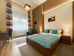 Posteľ alebo postele v izbe v ubytovaní ABT Apartments