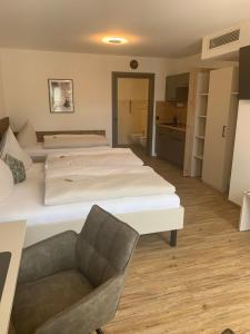 Postel nebo postele na pokoji v ubytování Hotel Bavaria