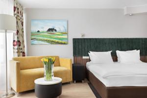 Posteľ alebo postele v izbe v ubytovaní Hotel Moderno Poznań