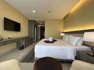 Una cama o camas en una habitación de Joyful Suite at Ion-Delemen Genting Highland 17 fotos más