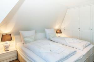 Ένα ή περισσότερα κρεβάτια σε δωμάτιο στο Austernblick