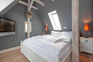 Postel nebo postele na pokoji v ubytování Nordstern