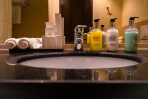 Een badkamer bij Imperial Suites Hotel
