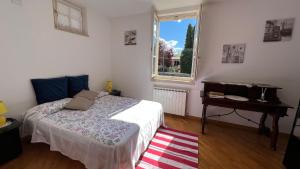 A bed or beds in a room at Country house al Toppo