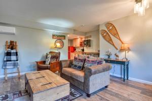 a living room with a couch and a table at MTN Town Escape-Beavers Den, 1 Bdrm luxury Apt in Green Mountain Falls