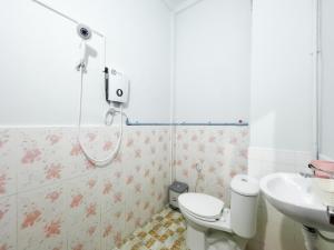 Koupelna v ubytování Lotus Blanc Homestay + 37 fotografií