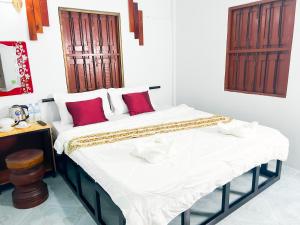 Postel nebo postele na pokoji v ubytování Lotus Blanc Homestay