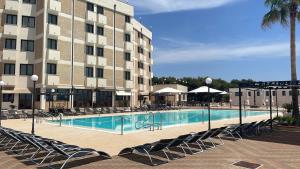 Бассейн в Apulia Hotel Taranto Ara Solis или поблизости