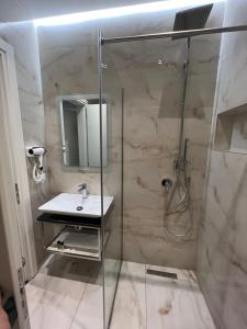 Bagno di Hotel LEON - Beach Front