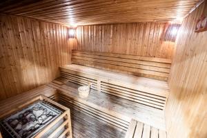 an overhead view of a wooden sauna at City Premiere Hotel Apartments - Dubai in Dubai