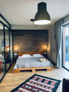 Letto o letti in una camera di Kazbegi Stylish Apartment