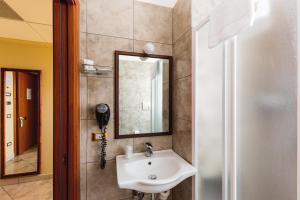 Ванная комната в Apulia Hotel Taranto Ara Solis