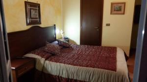 Postel nebo postele na pokoji v ubytování Hotel Chopin