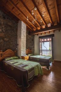 A bed or beds in a room at La Casa de Consuelo 3
