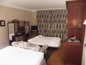 Postel nebo postele na pokoji v ubytování Posada Real Casa de Tepa