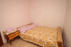 Ένα ή περισσότερα κρεβάτια σε δωμάτιο στο Seaside house for families with children Cove Kobiljak, Pasman - 320 +13 φωτογραφίες