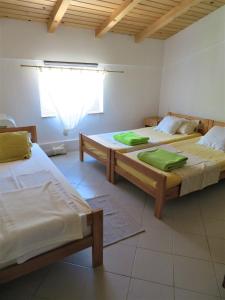 Ένα ή περισσότερα κρεβάτια σε δωμάτιο στο Seaside holiday house Zdrelac, Pasman - 340