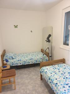 En eller flere senge i et værelse på Secluded fisherman's cottage Cove Zuborovica, Pasman - 321