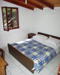 En eller flere senge i et værelse på Seaside secluded apartments Cove Dumboka bay - Dumboka (Dugi otok) - 395