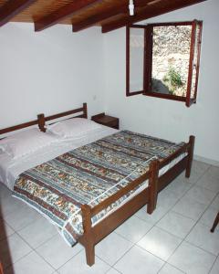 En eller flere senge i et værelse på Seaside secluded apartments Cove Dumboka bay - Dumboka (Dugi otok) - 395 + 14 billeder