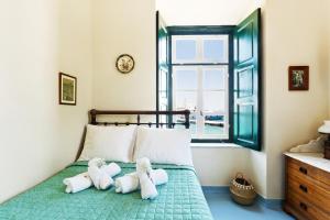 Postel nebo postele na pokoji v ubytování 1800 MANSION