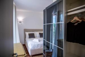 Posteľ alebo postele v izbe v ubytovaní Luxury Top Floor in Trastevere