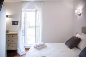Posteľ alebo postele v izbe v ubytovaní Luxury Top Floor in Trastevere