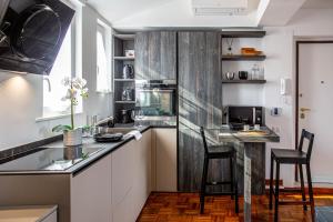 Kuchyňa alebo kuchynka v ubytovaní Luxury Top Floor in Trastevere
