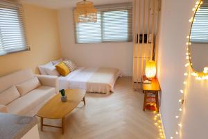Posezení v ubytování Hostel Mihojae Seomyeon