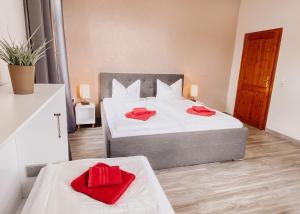 Postel nebo postele na pokoji v ubytování Hotel Am Rittergut