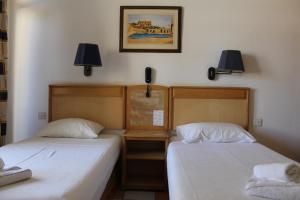Postel nebo postele na pokoji v ubytování The St. George’s Park Hotel