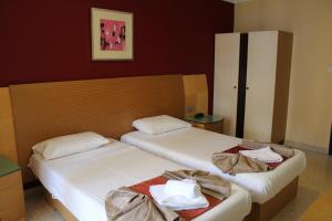 Postel nebo postele na pokoji v ubytování The St. George’s Park Hotel