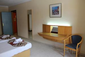 Postel nebo postele na pokoji v ubytování The St. George’s Park Hotel
