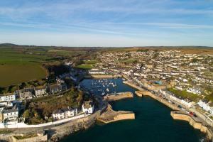 an aerial view of a town with a harbor at The Artist Loft, Ensuite Guest Rooms, Porthleven in Porthleven
