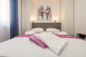 Posteľ alebo postele v izbe v ubytovaní La Prima Privlaka Luxury Apartments I + 7 fotografií